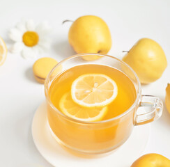 Spring and summer card. Daisies tea cup with lemon slice. Herbal tea with fresh flowers chamomile in mug. Vitamins, Healthy Diet. Concept of alternative medicine and immune boost. Cozy morning