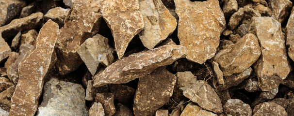 Texture of crushed stones. Lots of cobblestones.