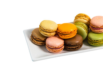 Colorful Macaroons Chocolate, Pistachio, Cherry, Orange, Vanilla Flavor Background Isolated on White Background. Selective focus.