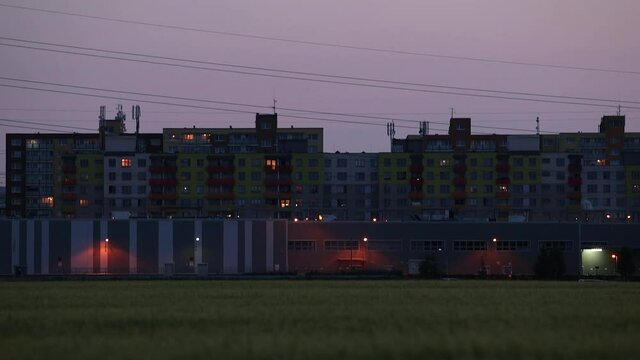Residential apartment buildings with people. Self-isolation of the house in the evening.