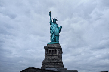 Fototapeta na wymiar Statue of Liberty on the background of sky, New York City.