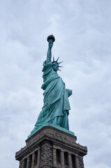 Fototapeta premium Statue of Liberty on the background of sky, New York City.