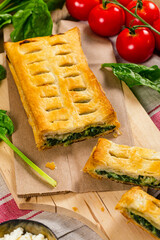 Spinach and Feta Cheese Strudel. Puff Pastry Filled with Spinach and Ricotta Cheese. Selective focus.