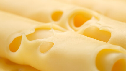 gold Swiss cheese with holes. macro shot