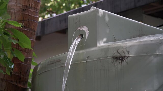 Overflow of saltwater from tank at a desalination plant, static shot