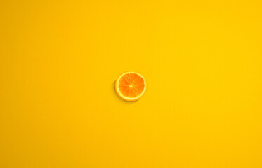 cross section of orange with yellow background.
Minimal concept art.
