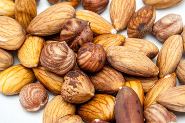 nuts in the dish. Hazelnuts and Almonds