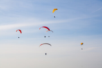 paragliding in the blue sky