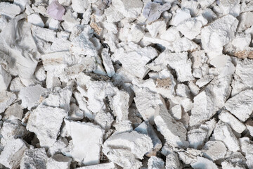 waste pile of styropor or styrofoam trash in disposable landfill for recycling  
