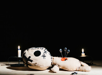 voodoo doll for your magic ritual on a black background
