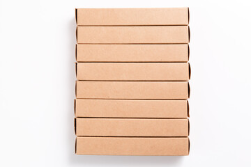 Oblong cardboard boxes on white background. Mockup image. Delivery and package concept