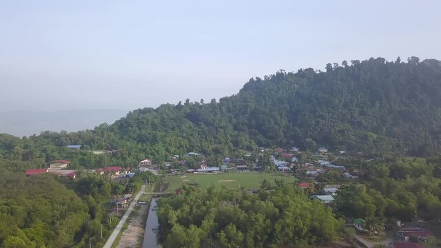 Aerial view Malays kampung at bottom of hill at Juru, Penang.