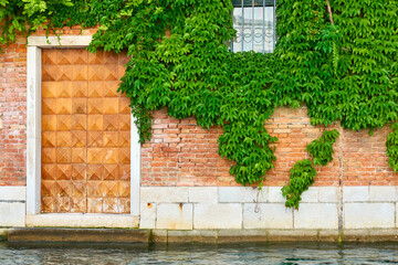 Old house by canal in Venice
