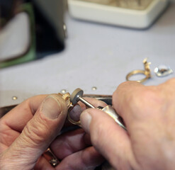 Hands of jeweler at work