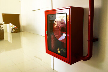 Cabinet on the wall for keep fire extinguishers Equipment of car showroom