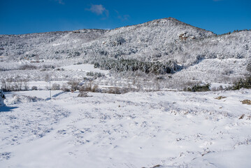 Fototapeta na wymiar Panorama of a snow covered mountain in Catalonia, Spain. Beautiful winter landscape