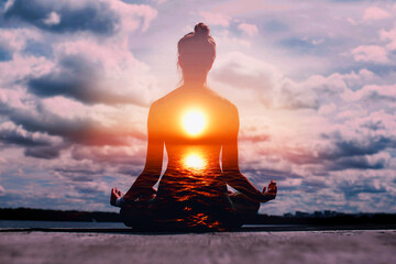Yoga day concept. Multiple exposure image. Woman practicing lotus asana at sunset. - obrazy, fototapety, plakaty