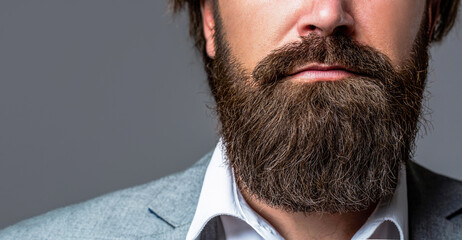 Perfect beard. Close-up of young bearded man. Close up of handsome beard hipster elegant male....