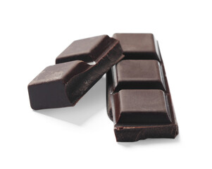 Pieces of delicious dark chocolate isolated on white