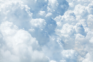 White & blue soft cumulus clouds in the sky close up background, big fluffy cloud texture, beautiful cloudscape skies backdrop, sunny cloudy heaven pattern, cloudiness weather landscape, copy space - obrazy, fototapety, plakaty