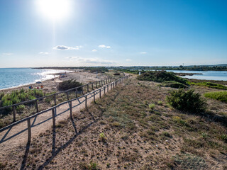 Beautiful view of Salina dei Monaci, old salt pan in the Salento coastal area, Torre Colimena,...
