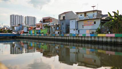Slum area on the riverbank in Jakarta. Indonesia.