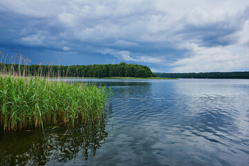 Beautifully cloudy sky over the lake in Warmia and Mazury