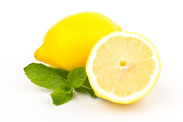 Group of lemons with mint leaves, isolated on white background