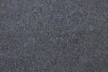 Dark grey granite background used for kitchen worktop, table, window sill, fence. Black and white...