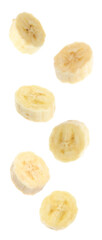 Set with delicious ripe banana pieces falling on white background