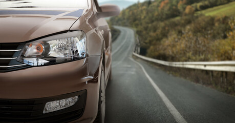 Fototapeta premium Road trip. Car driving on asphalt highway, banner design