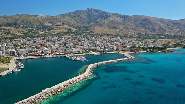 Aerial drone photo of famous seaside town and port of Karistos in South Evia island, Greece © aerial-drone