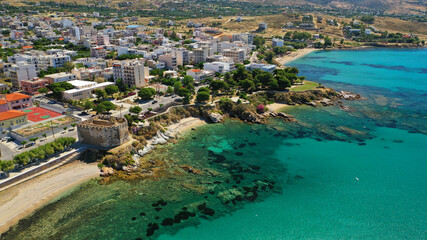 Aerial drone photo of famous seaside town and port of Karistos in South Evia island, Greece