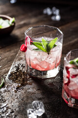 Rhubarb lemonade with fresh mint. Dark background.