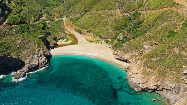 Aerial drone photo of secluded sandy emerald beach and canyon of Agios Dimitrios near Karistos, South Evia island, Greece