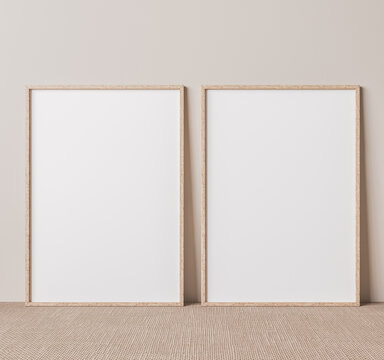 Vertical wooden frame mock up on beige floor. Set of two wooden frame mock up poster. Two vertical frame 3D render