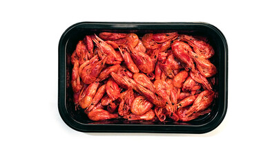 isolated small fried shrimp in the form of snacks on a white background close-up.