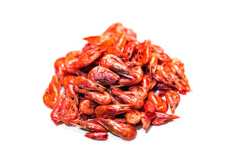 isolated small fried shrimp in the form of snacks on a white background close-up.