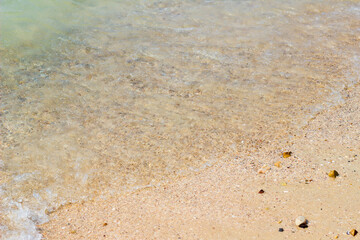 Sandy beach and blue sea in summer