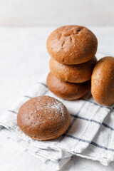 Fresh baked buns on bright background.