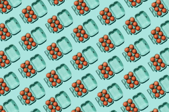Pattern of chicken eggs in turquoise colored cartons