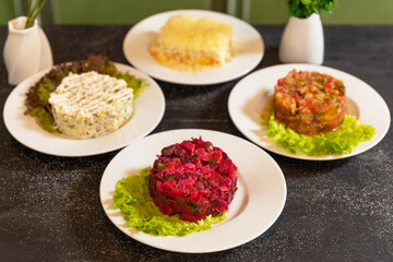 Tasty beetroot, eggplant, mimosa stolichny salad