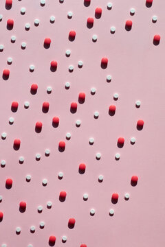 Studio shot of red and white pills