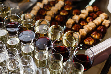 A dining table filled with wine glasses