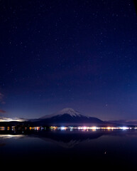 Mount Fuji with snowcap & starry night, from Lake Yamanaka, Japan
