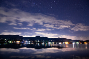 Reflection from the water surface on a starry night, Lake Yamanaka, Japan