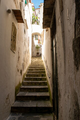 Fototapeta na wymiar antique stairs in a italian village