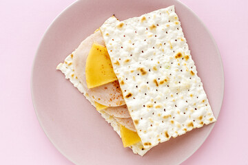 Salty crackers with sausage chicken, cheese and paprika
