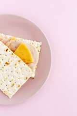 Salty crackers with sausage chicken, cheese and paprika