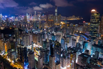 Fotobehang  Top view of Hong Kong city at night © leungchopan
